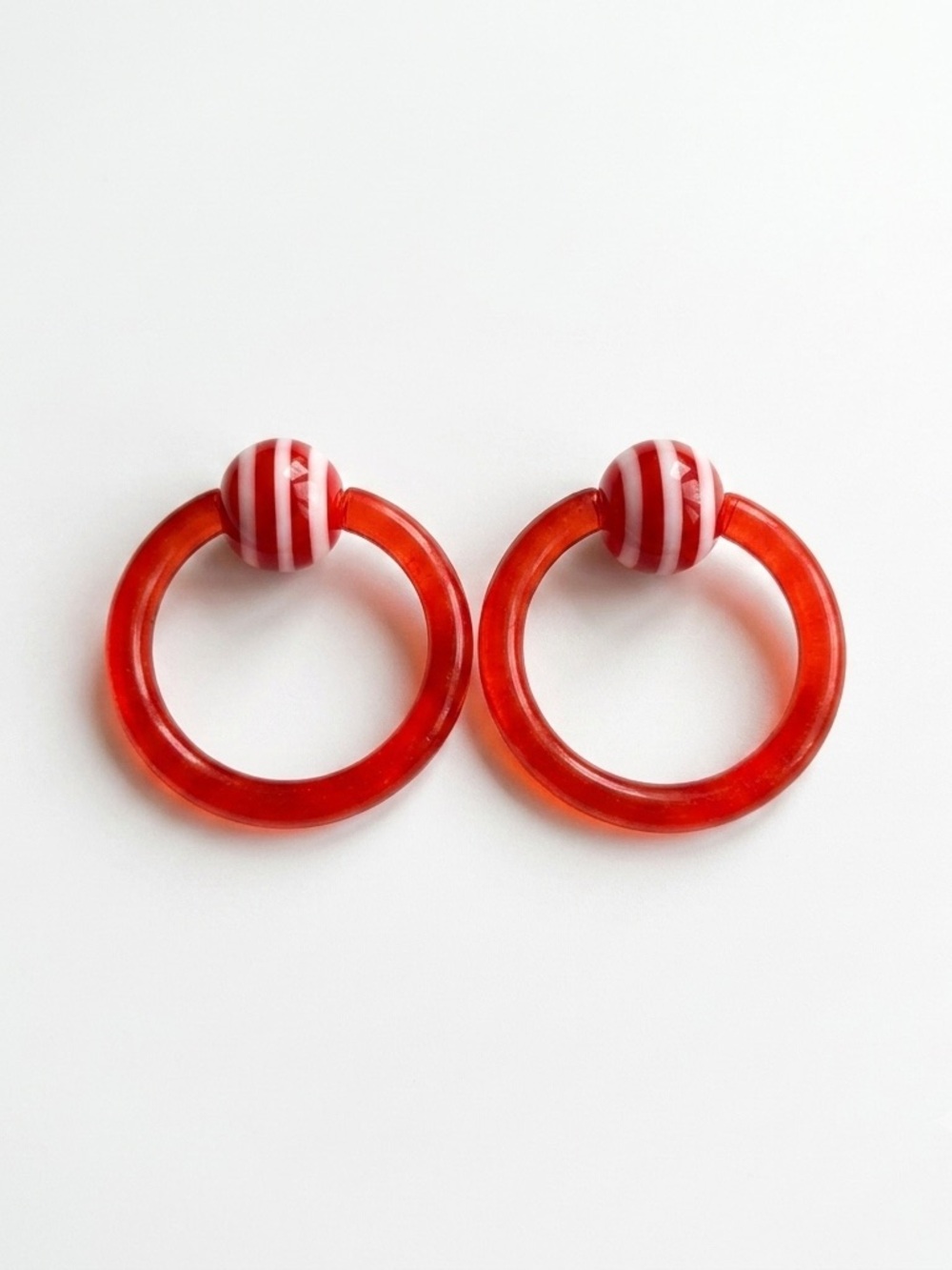 12g 7/16 Captive Bead Ring Pr Red w/ Red & White Striped Beads